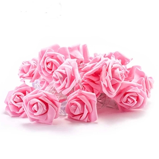 Flot lyskæde med lyserød roser